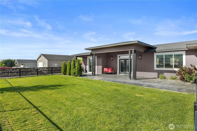 419 Edgewater Way SW, Mattawa, WA 99349 - back of house featuring stucco siding and a patio area