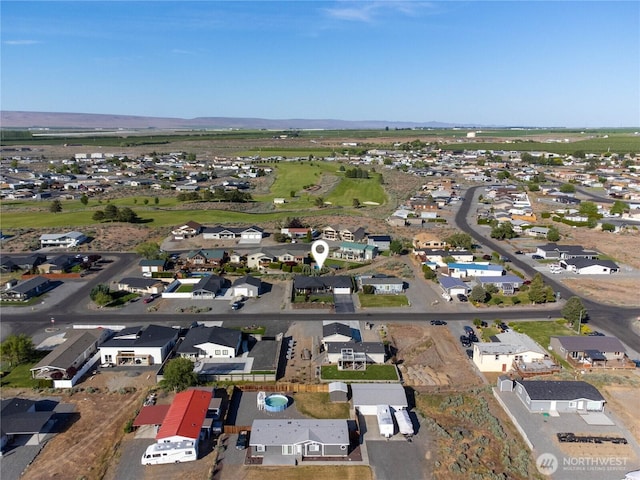 419 Edgewater Way SW, Mattawa, WA 99349 - aerial view of property's location with nearby suburban area and a mountain backdrop