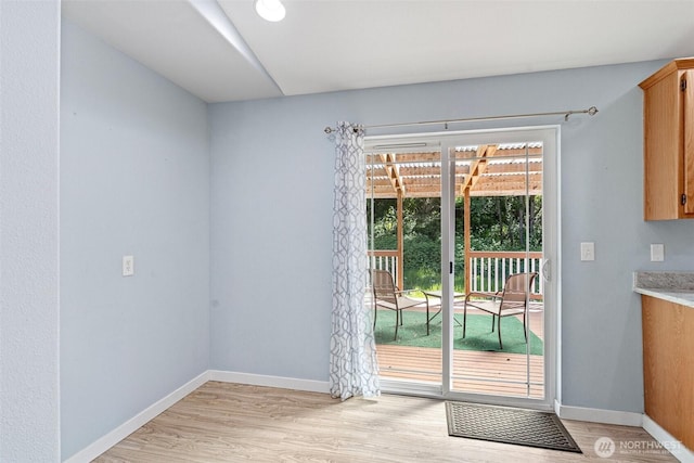592 Kodiak Ave, Camano Island, WA 98282 - doorway featuring light wood finished floors and baseboards