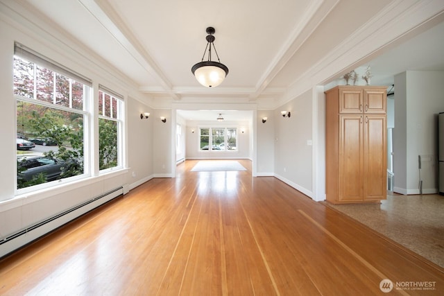 703 18th Ave S, Seattle, WA 98144 - spare room with baseboard heating, beam ceiling, baseboards, light wood-style flooring, and ornamental molding