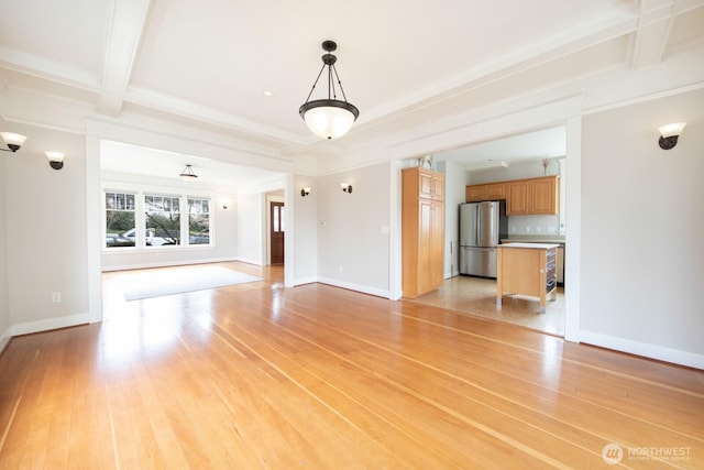 703 18th Ave S, Seattle, WA 98144 - unfurnished living room with light wood-type flooring, beamed ceiling, baseboards, and ornamental molding