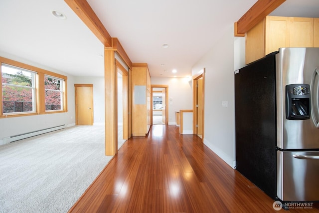 703 18th Ave S, Seattle, WA 98144 - hall with baseboard heating, wood finished floors, baseboards, and recessed lighting