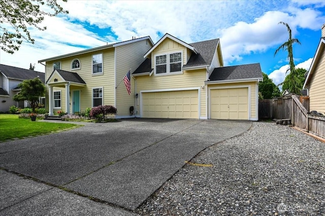 16886 Wales St SE, Monroe, WA 98272 - traditional-style house with concrete driveway, a garage, board and batten siding, and roof with shingles