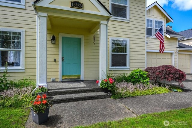 16886 Wales St SE, Monroe, WA 98272 - doorway to property featuring a garage