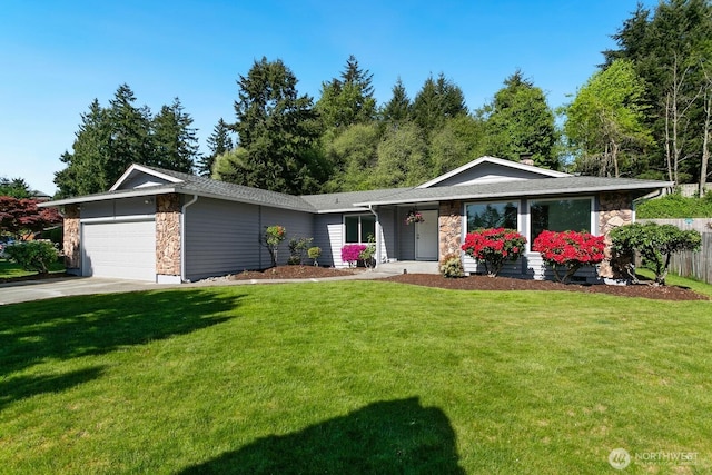 15221 42nd Ave E, Tacoma, WA 98446 - ranch-style house featuring stone siding, a garage, and a front lawn