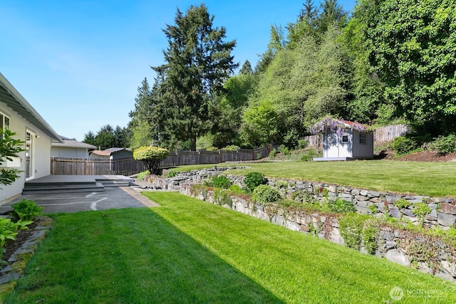 15221 42nd Ave E, Tacoma, WA 98446 - view of yard with a storage shed and an outdoor structure