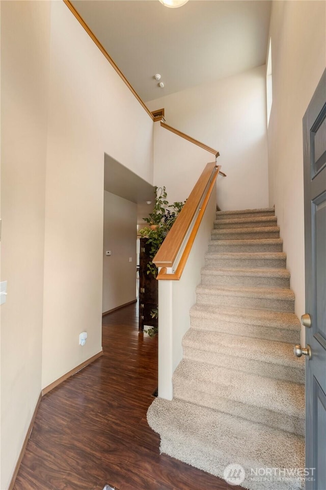 20402 98th Avenue Ct E, Graham, WA 98338 - staircase featuring wood finished floors and baseboards