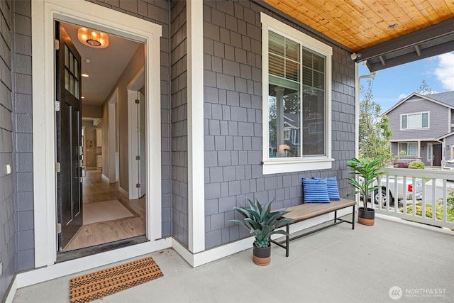doorway to property with a porch