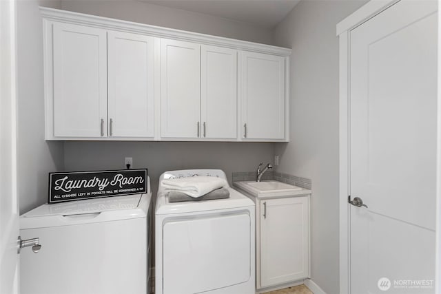 laundry area featuring cabinet space and independent washer and dryer