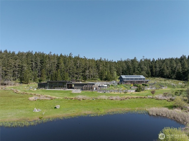 5621 Fisherman Bay Rd, Lopez Island, WA 98261 - aerial view of property and surrounding area featuring a forest and a nearby body of water