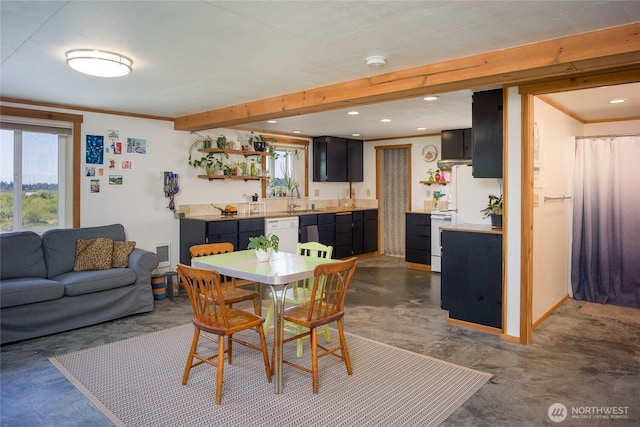 5621 Fisherman Bay Rd, Lopez Island, WA 98261 - dining space with healthy amount of natural light, crown molding, recessed lighting, and concrete flooring
