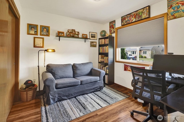 home office with wood finished floors