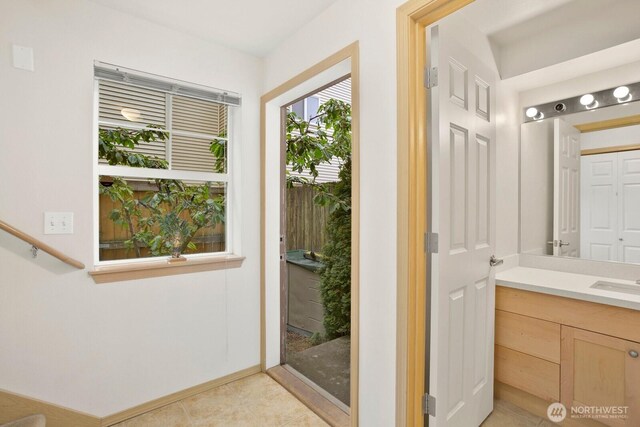 1140 N 92nd Unit B, Seattle, WA 98103 - bathroom featuring vanity and tile patterned floors