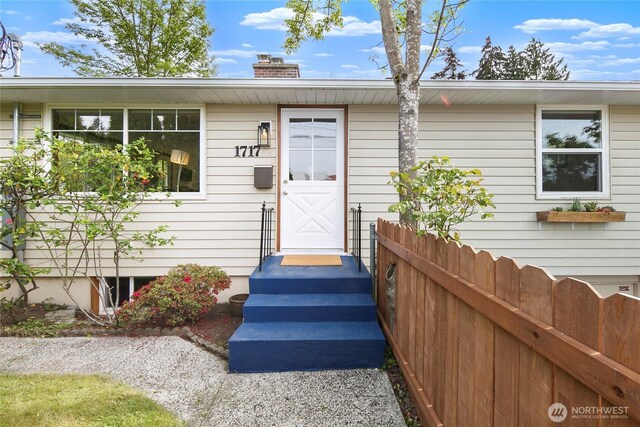 view of front of home with a chimney