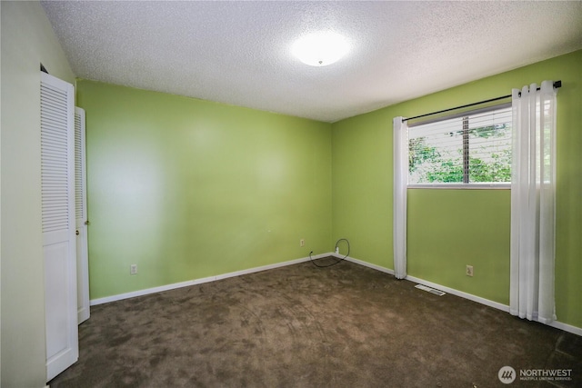 1234 Friedlander Dr, Aberdeen, WA 98520 - empty room with carpet, a textured ceiling, and baseboards