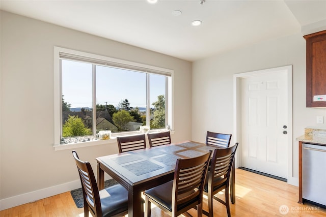 1215 Lawrence St Unit 201, Port Townsend, WA 98368 - dining room with healthy amount of natural light, light wood-type flooring, baseboards, and recessed lighting