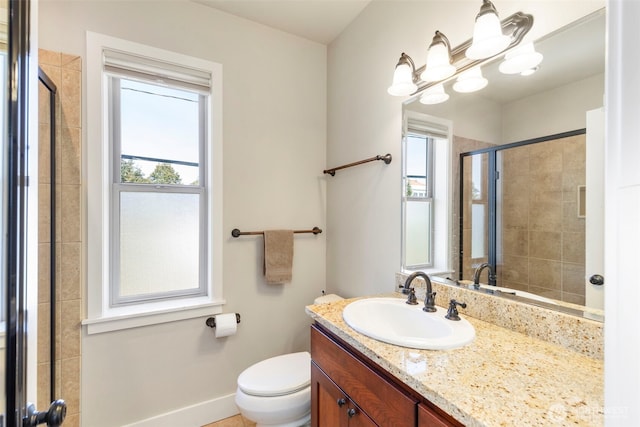1215 Lawrence St Unit 201, Port Townsend, WA 98368 - full bathroom featuring vanity, plenty of natural light, and a shower stall