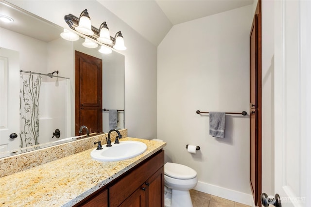 1215 Lawrence St Unit 201, Port Townsend, WA 98368 - bathroom featuring vanity, a shower with shower curtain, toilet, tile patterned flooring, and baseboards