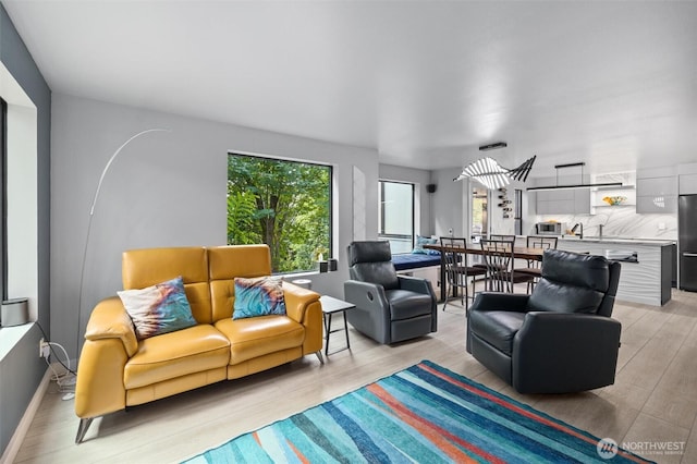 living area with light wood-style flooring