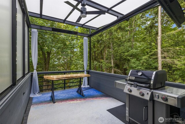 sunroom / solarium with ceiling fan and healthy amount of natural light
