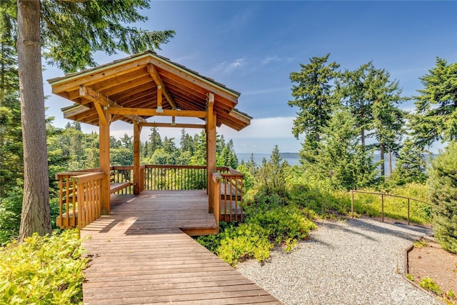 wooden deck featuring a gazebo