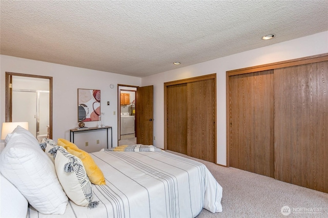 bedroom with washer / dryer, multiple closets, carpet, recessed lighting, and a textured ceiling