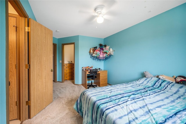 9006 190th St E, Puyallup, WA 98375 - bedroom with light colored carpet and a ceiling fan