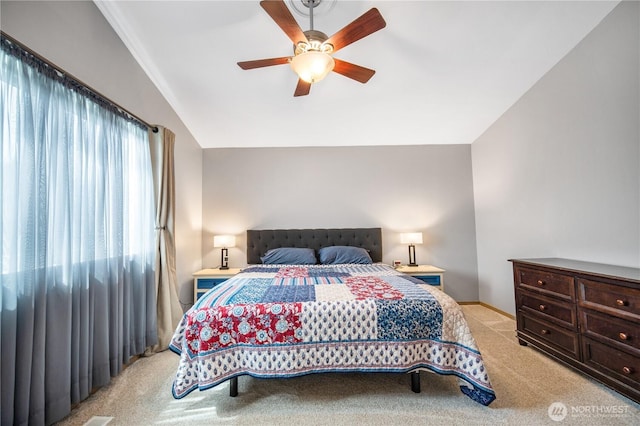9006 190th St E, Puyallup, WA 98375 - bedroom featuring carpet floors, a ceiling fan, vaulted ceiling, and baseboards