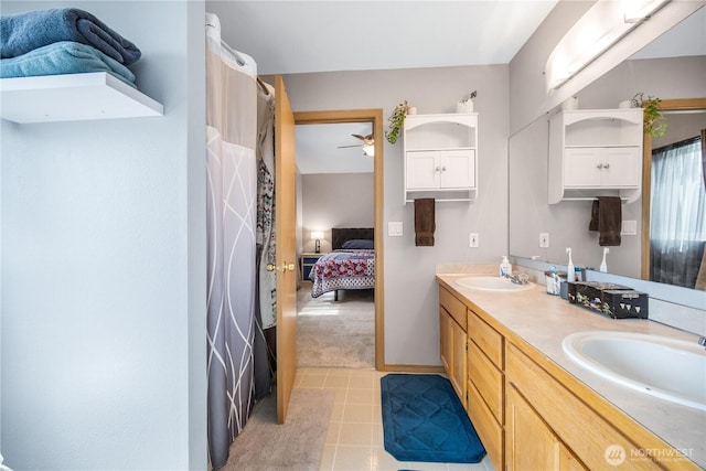 9006 190th St E, Puyallup, WA 98375 - ensuite bathroom with a ceiling fan, double vanity, and curtained shower