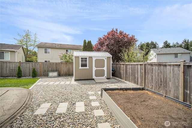 9006 190th St E, Puyallup, WA 98375 - fenced backyard featuring a shed, an outdoor structure, and a residential view