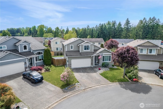 9006 190th St E, Puyallup, WA 98375 - view of front of house featuring driveway and a residential view
