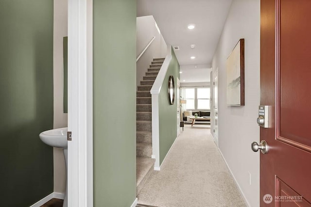 corridor with stairway, carpet, baseboards, and recessed lighting
