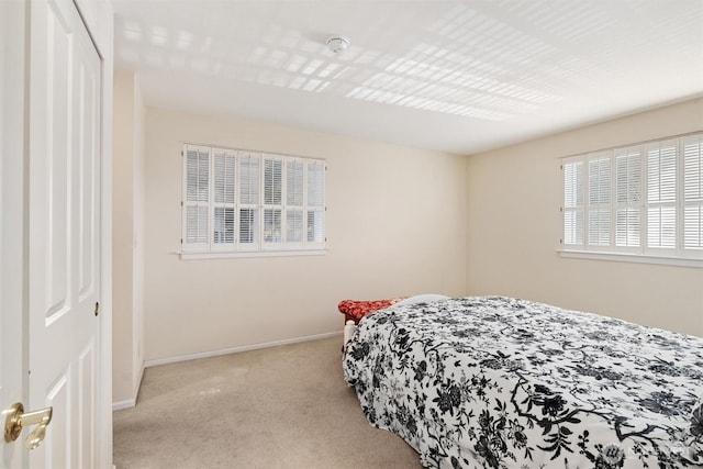 514 Bell St, Edmonds, WA 98020 - carpeted bedroom featuring a closet and baseboards