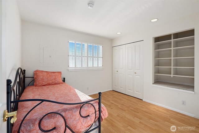 514 Bell St, Edmonds, WA 98020 - bedroom featuring a closet, light wood-type flooring, baseboards, and recessed lighting