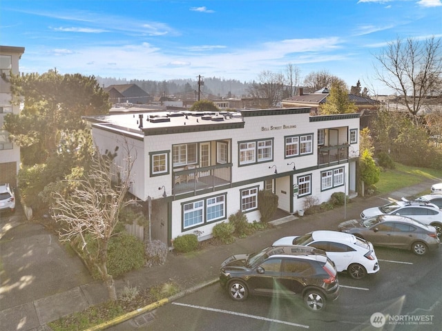 514 Bell St, Edmonds, WA 98020 - view of front of property with a balcony and uncovered parking