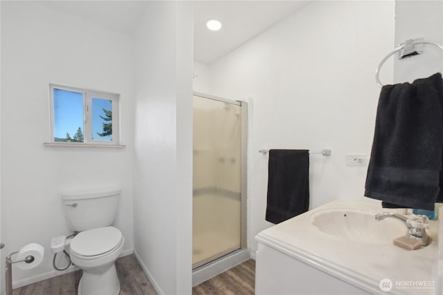 11 Ridge Loop Rd, Cle Elum, WA 98922 - bathroom featuring wood finished floors, a shower stall, toilet, and vanity