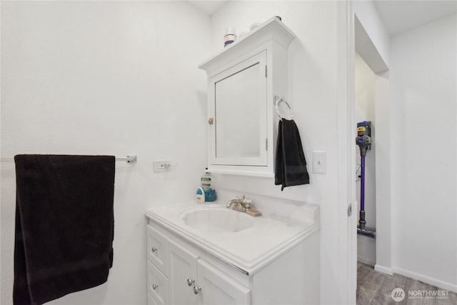 11 Ridge Loop Rd, Cle Elum, WA 98922 - bathroom with vanity, wood finished floors, and baseboards