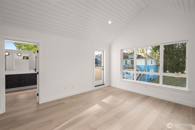 1625B 21st Ave, Seattle, WA 98122 - spare room with lofted ceiling, light wood-style floors, baseboards, and wood ceiling