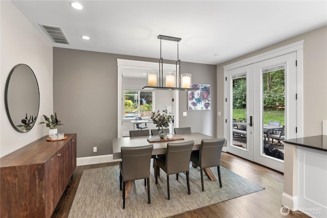 856 Hilltop Ave, Kent, WA 98031 - dining area with french doors, dark wood finished floors, recessed lighting, and baseboards