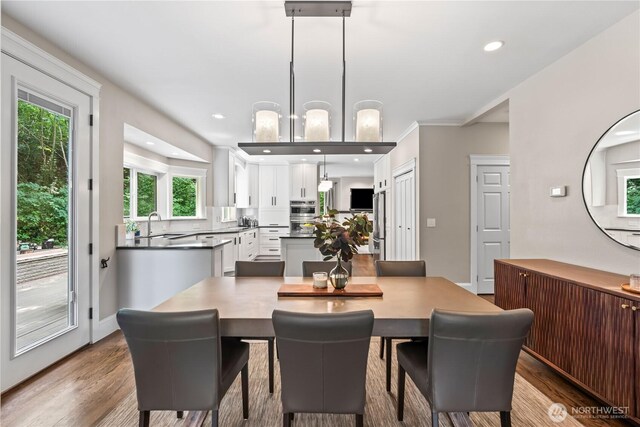 856 Hilltop Ave, Kent, WA 98031 - dining area featuring wood finished floors and recessed lighting