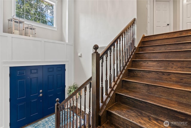 856 Hilltop Ave, Kent, WA 98031 - staircase with a decorative wall and a wainscoted wall