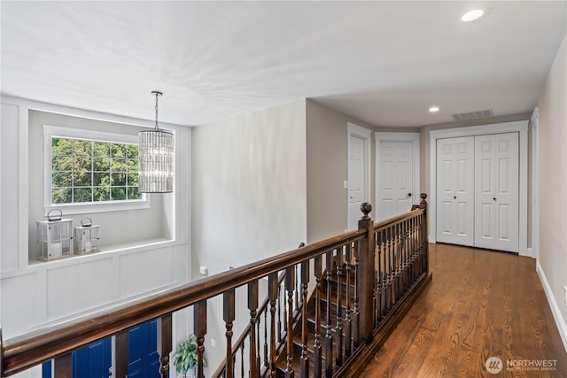 856 Hilltop Ave, Kent, WA 98031 - corridor featuring an upstairs landing, dark wood-type flooring, a chandelier, and recessed lighting
