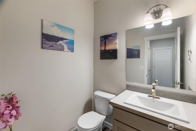 3215 64th Ln SW, Olympia, WA 98512 - half bath with toilet, vanity, and tasteful backsplash