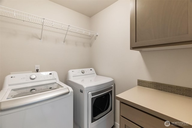 3215 64th Ln SW, Olympia, WA 98512 - washroom with separate washer and dryer and cabinet space