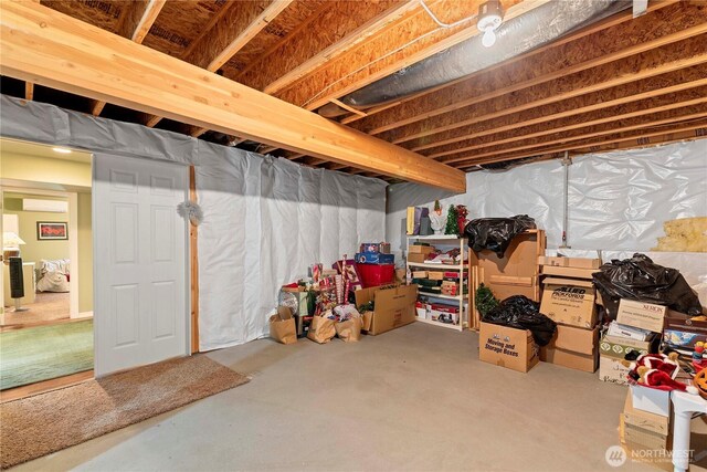 1552 Huntwood Ln, East Wenatchee, WA 98802 - unfinished basement featuring an AC wall unit