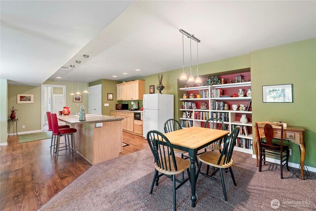 1552 Huntwood Ln, East Wenatchee, WA 98802 - dining space with baseboards, wood finished floors, and recessed lighting