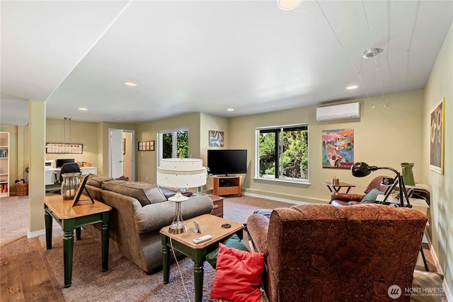 1552 Huntwood Ln, East Wenatchee, WA 98802 - living area featuring a wall mounted air conditioner, recessed lighting, baseboards, and wood finished floors