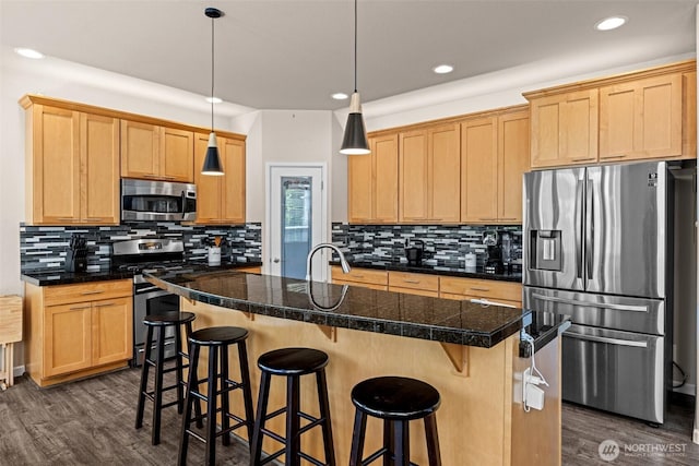 4002 33rd St NE, Tacoma, WA 98422 - kitchen featuring appliances with stainless steel finishes, tile countertops, dark wood-style flooring, backsplash, and recessed lighting