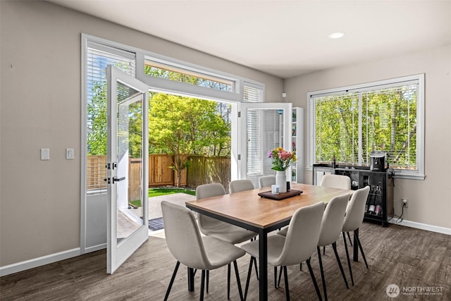 4002 33rd St NE, Tacoma, WA 98422 - dining space with baseboards and wood finished floors