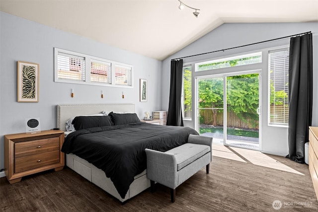 4002 33rd St NE, Tacoma, WA 98422 - bedroom featuring access to exterior, lofted ceiling, and dark wood-style flooring